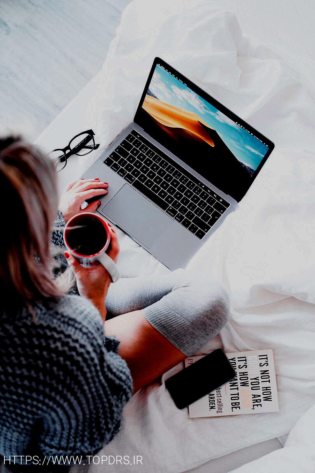 Woman Using Her Laptop in Bed